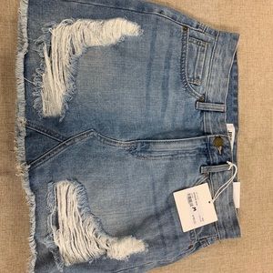 Distressed denim skirt